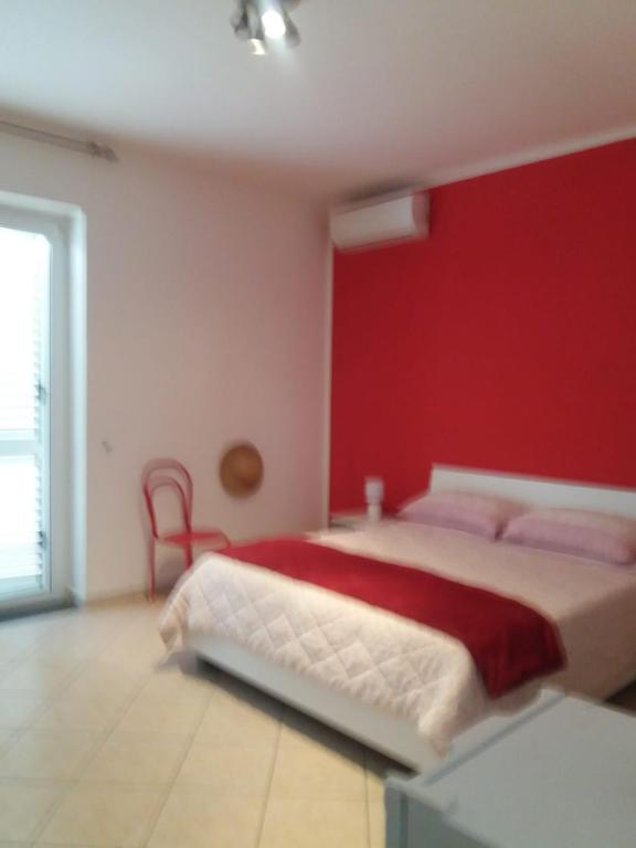 Łóżko lub łóżka w pokoju w obiekcie villa lucia