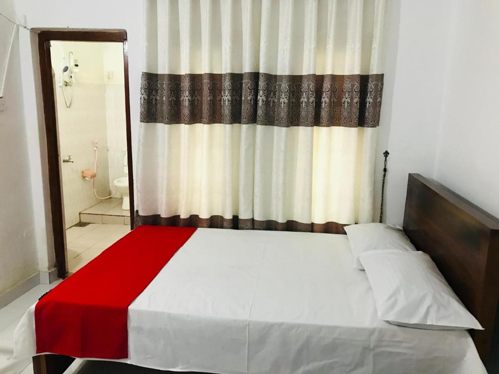 Postel nebo postele na pokoji v ubytování BATTI REST