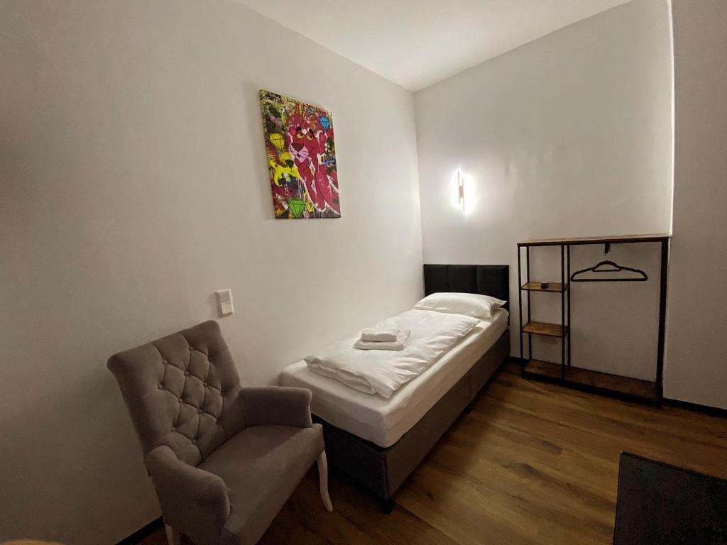 Postel nebo postele na pokoji v ubytování Hotel Elisei