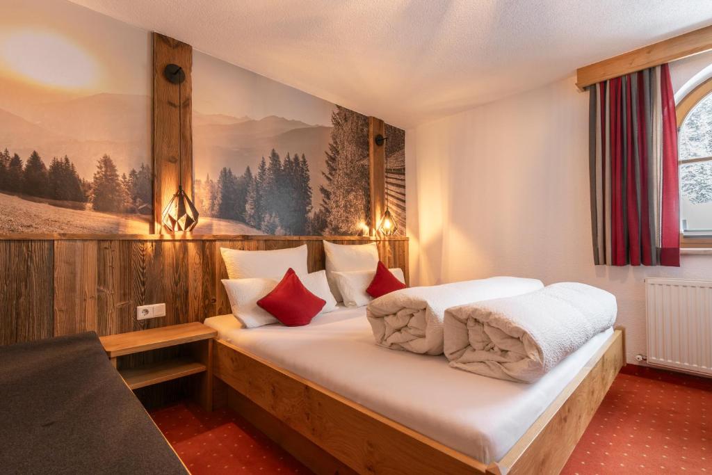 Postel nebo postele na pokoji v ubytování Apart WiesenPlatzl