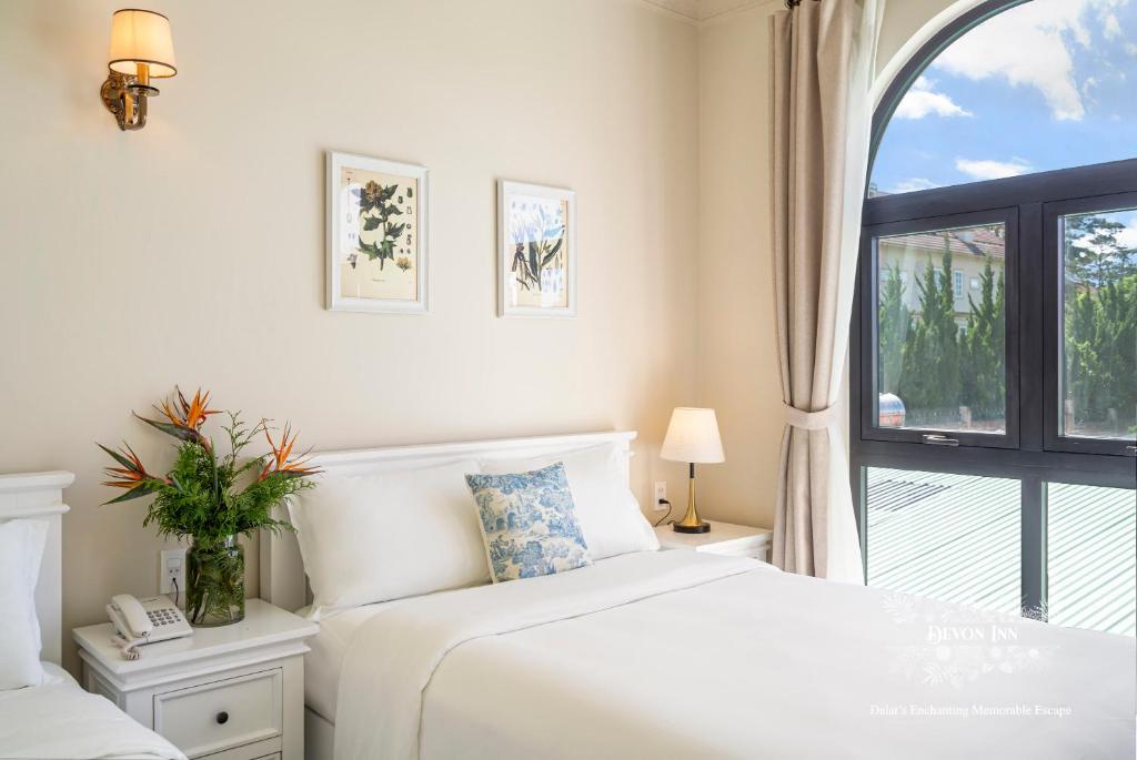 Devon Inn - Habitación Cuádruple Estándar