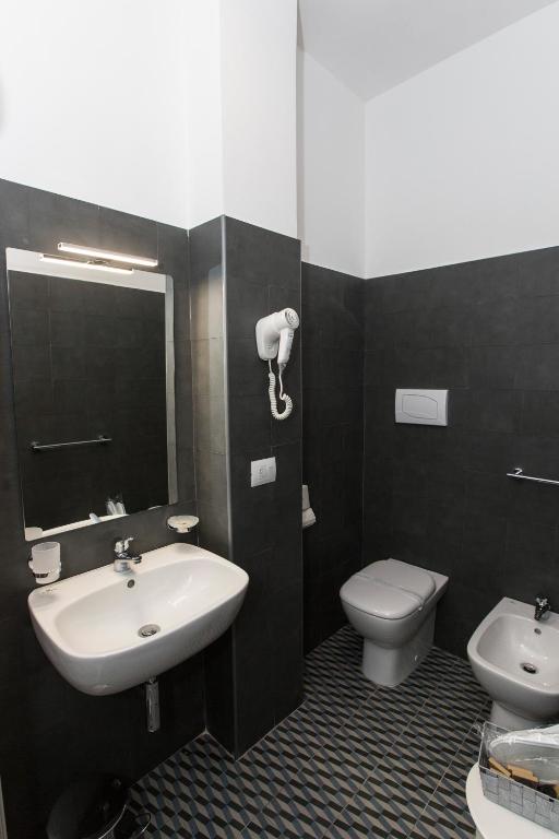 Koupelna v ubytování Malù Suites
