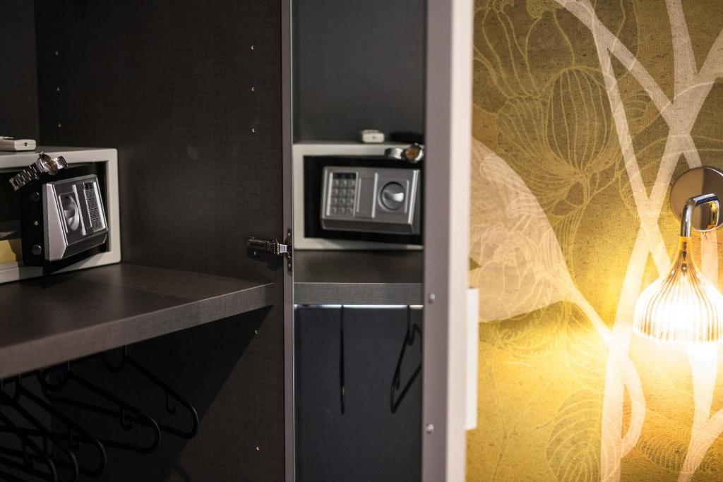 Kuchyň nebo kuchyňský kout v ubytování Malù Suites