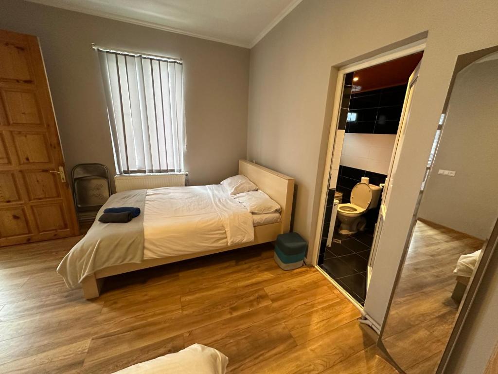 Postel nebo postele na pokoji v ubytování Green Villa Tsaghveri
