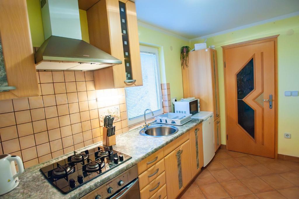 Kuchyň nebo kuchyňský kout v ubytování Country House & Spa