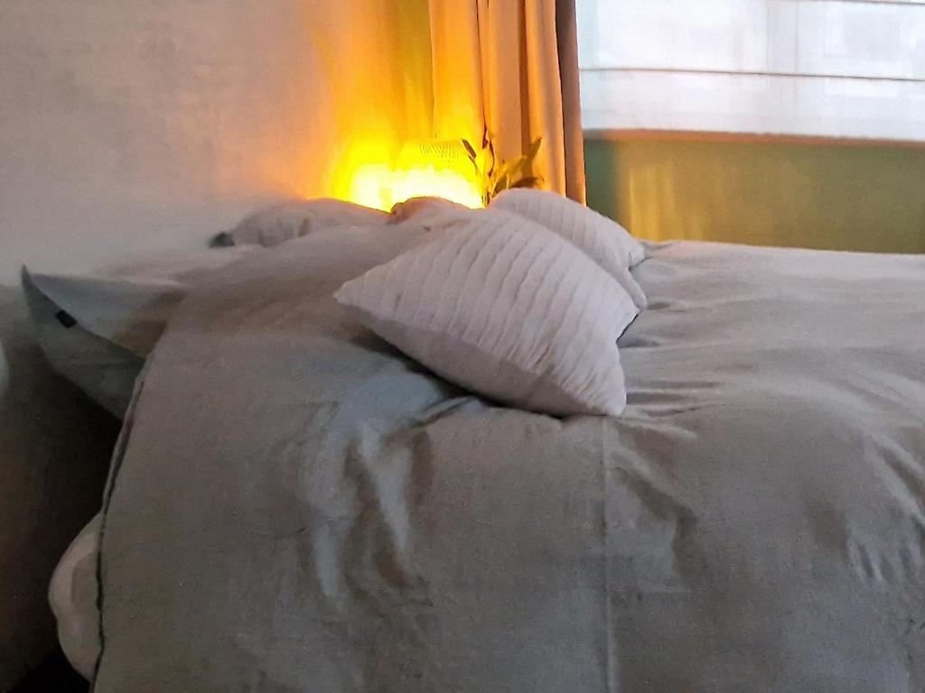 Postel nebo postele na pokoji v ubytování Bulle D'eau
