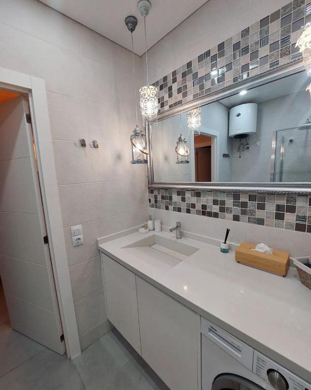 Kúpeľňa v ubytovaní ORLANDO LUXURY APARTAMENT
