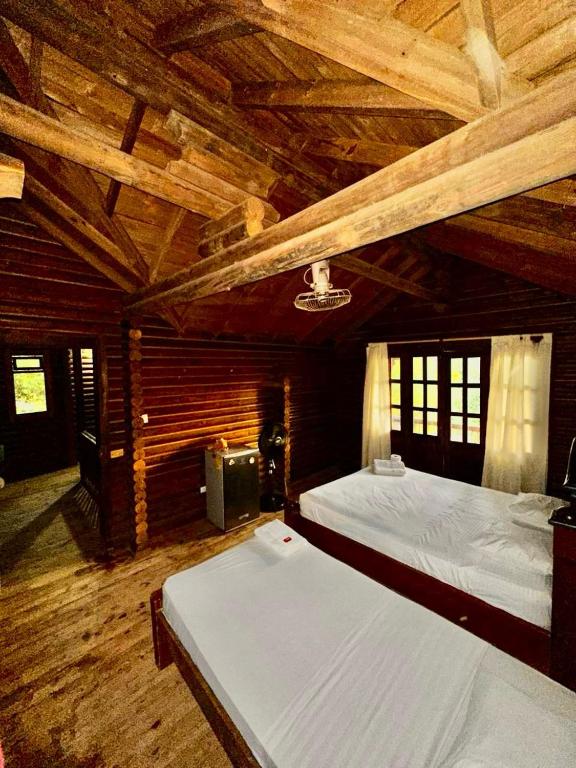 Postel nebo postele na pokoji v ubytování Mistica Island Hostel - Isla Palma