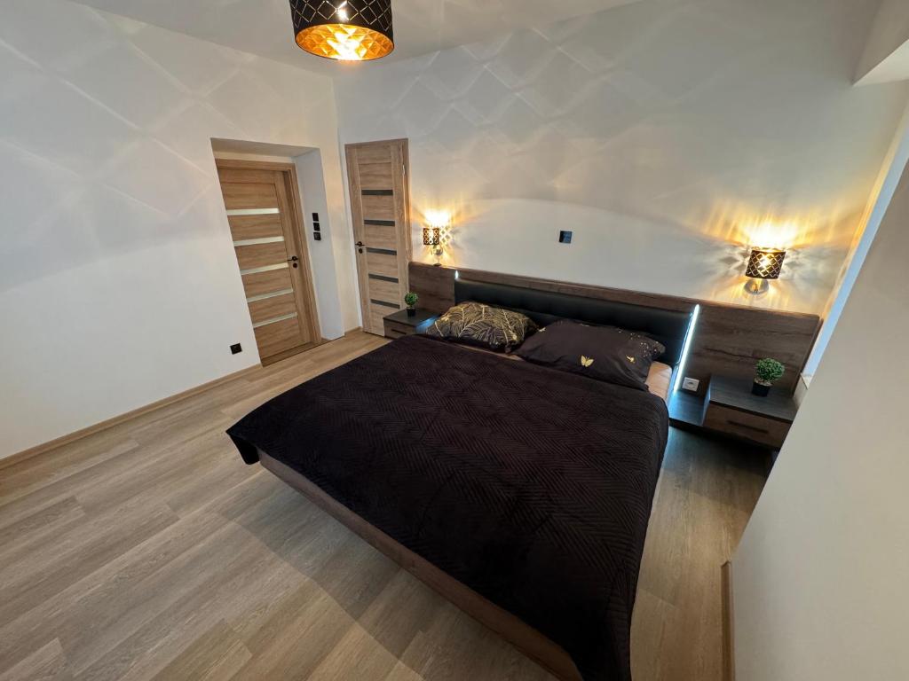 Voodi või voodid majutusasutuse Apartmán Alfa toas