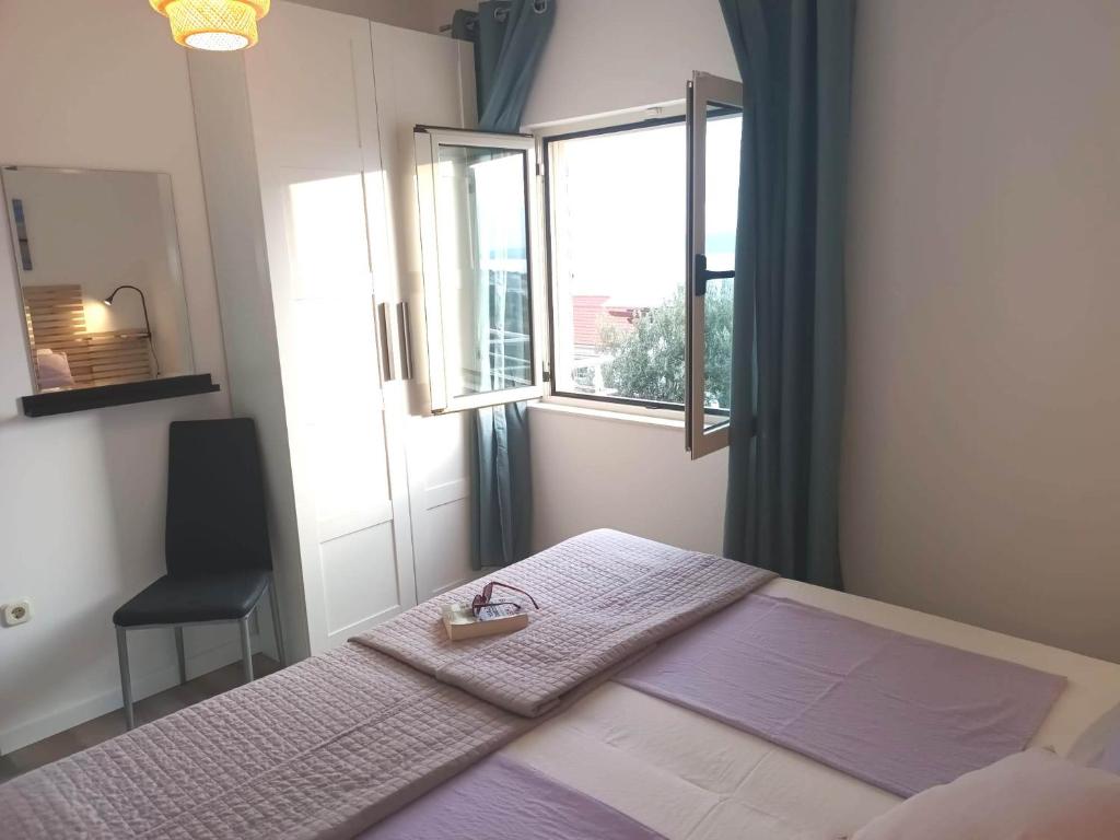 Postel nebo postele na pokoji v ubytování Villa Lara Apartments