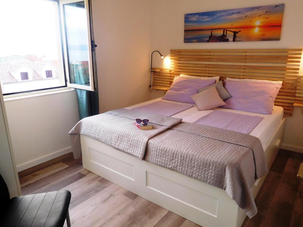 Postel nebo postele na pokoji v ubytování Villa Lara Apartments