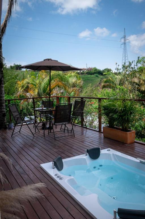 La alberca dentro o cerca de Ibuku Hotel Guatapé - Chalets