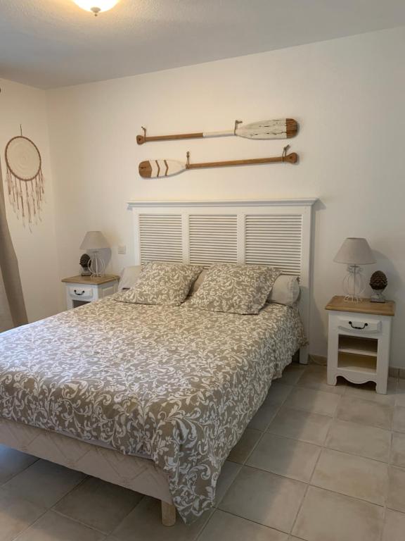 Postel nebo postele na pokoji v ubytování Suite dans un petit paradis