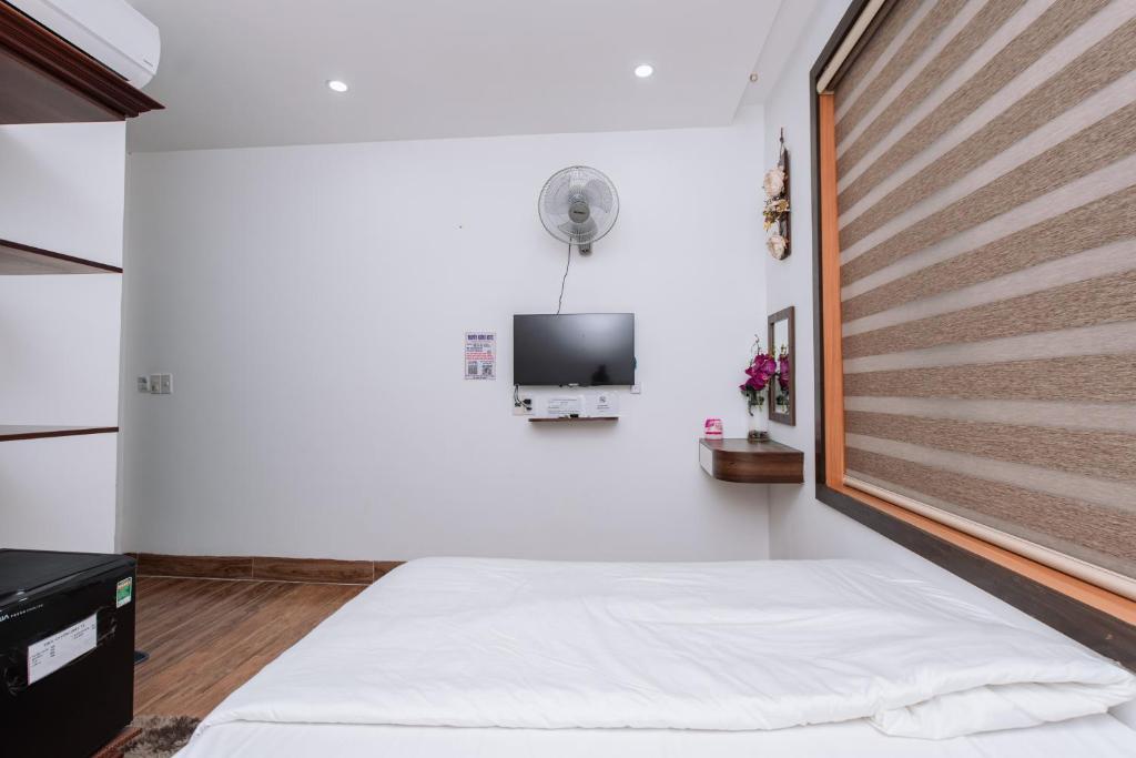 TV a/nebo společenská místnost v ubytování Nguyên Hương Hotel