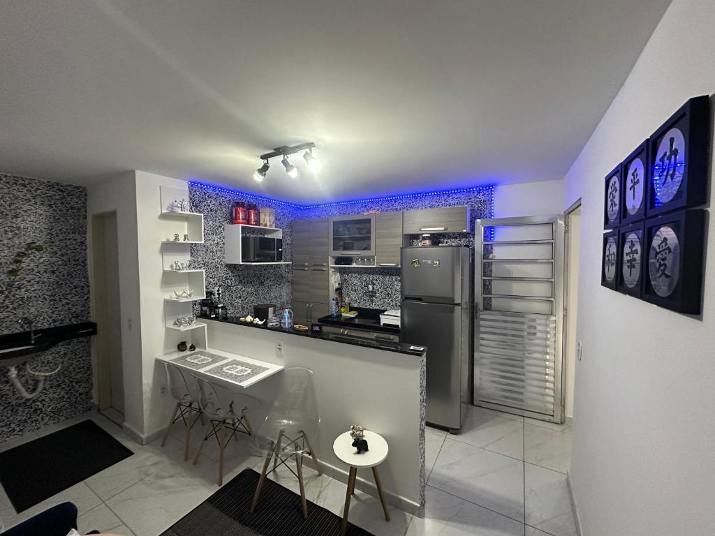 Kuchyň nebo kuchyňský kout v ubytování Cantinho Aconchegante - Quarto 01 AR-condicionado