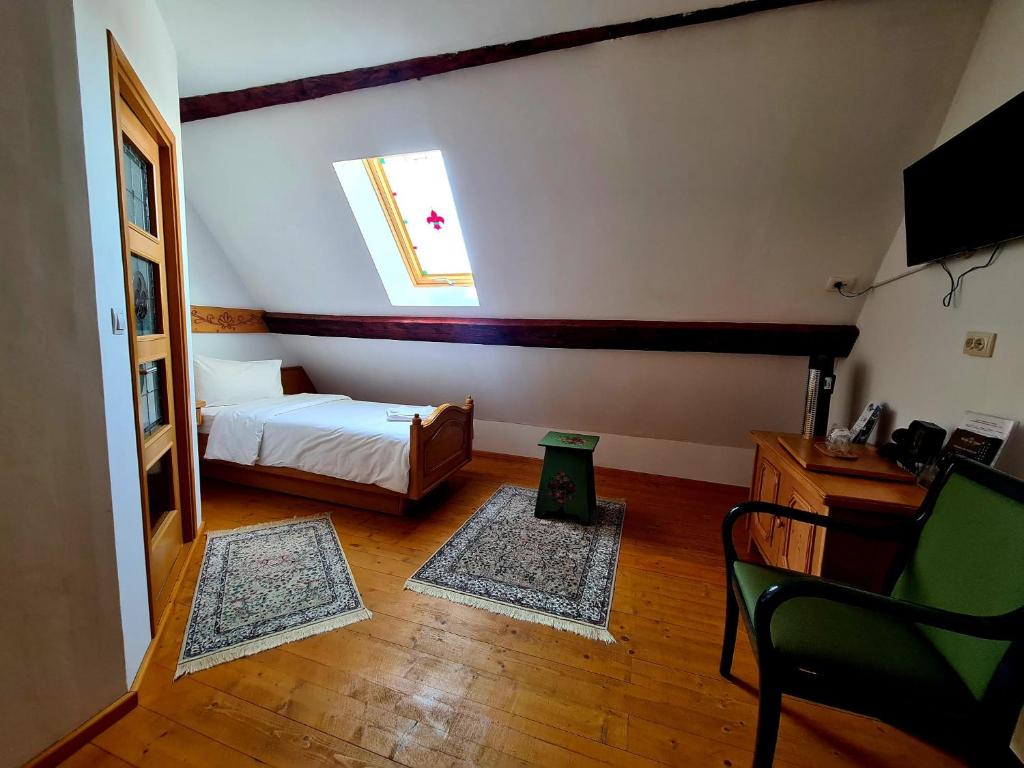 TV a/nebo společenská místnost v ubytování Armenopolis - Adults Only