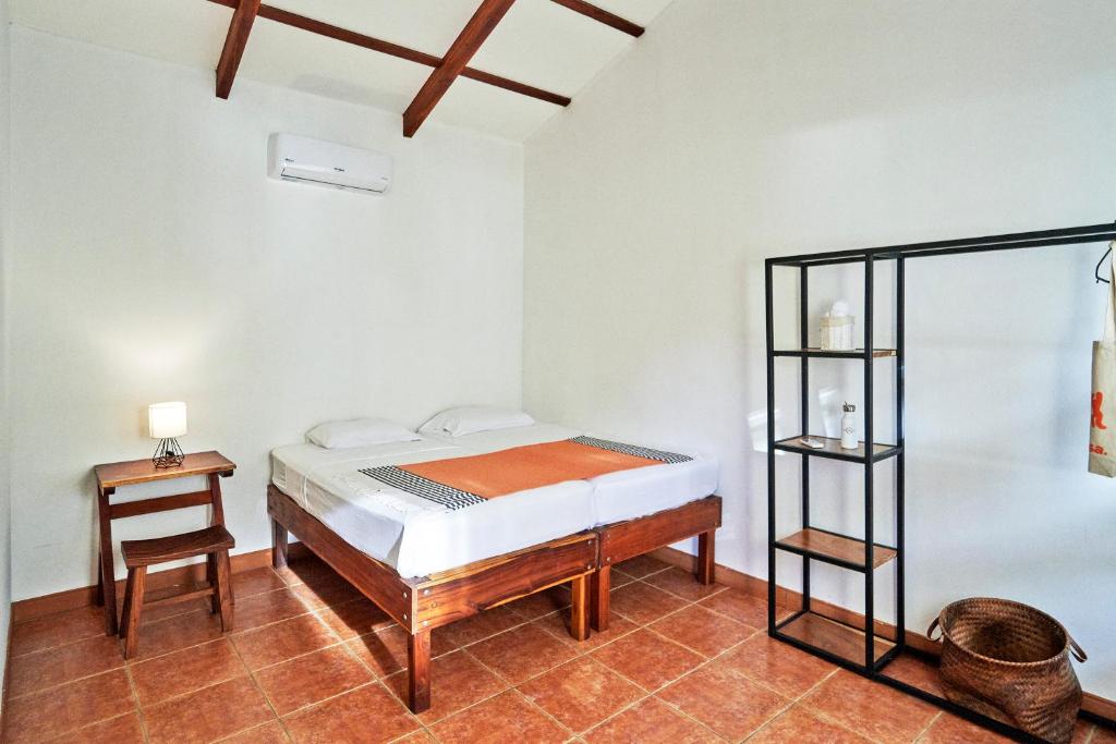 Postel nebo postele na pokoji v ubytování Casa Calocita