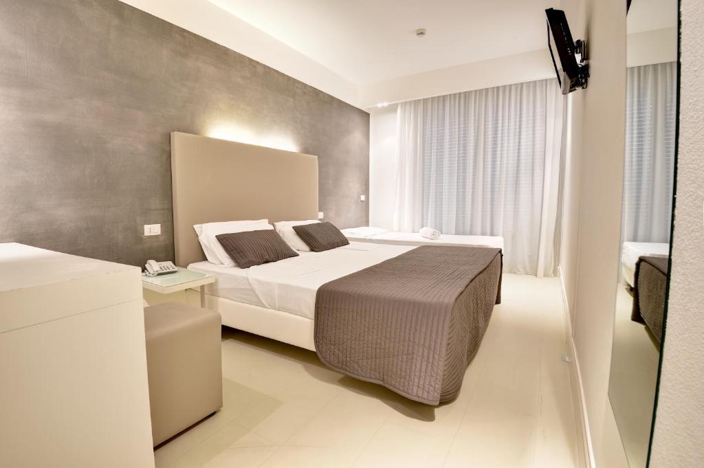 Postel nebo postele na pokoji v ubytování Boutique Hotel Bali