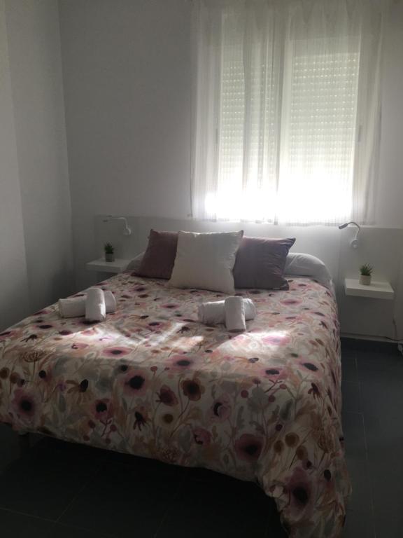 Postel nebo postele na pokoji v ubytování Apartamento Oliva Nova Beach & MET & Golf