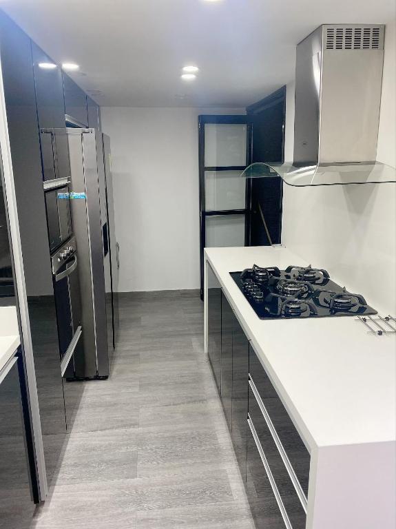 Kuchyň nebo kuchyňský kout v ubytování Casa vacacional en Pereira
