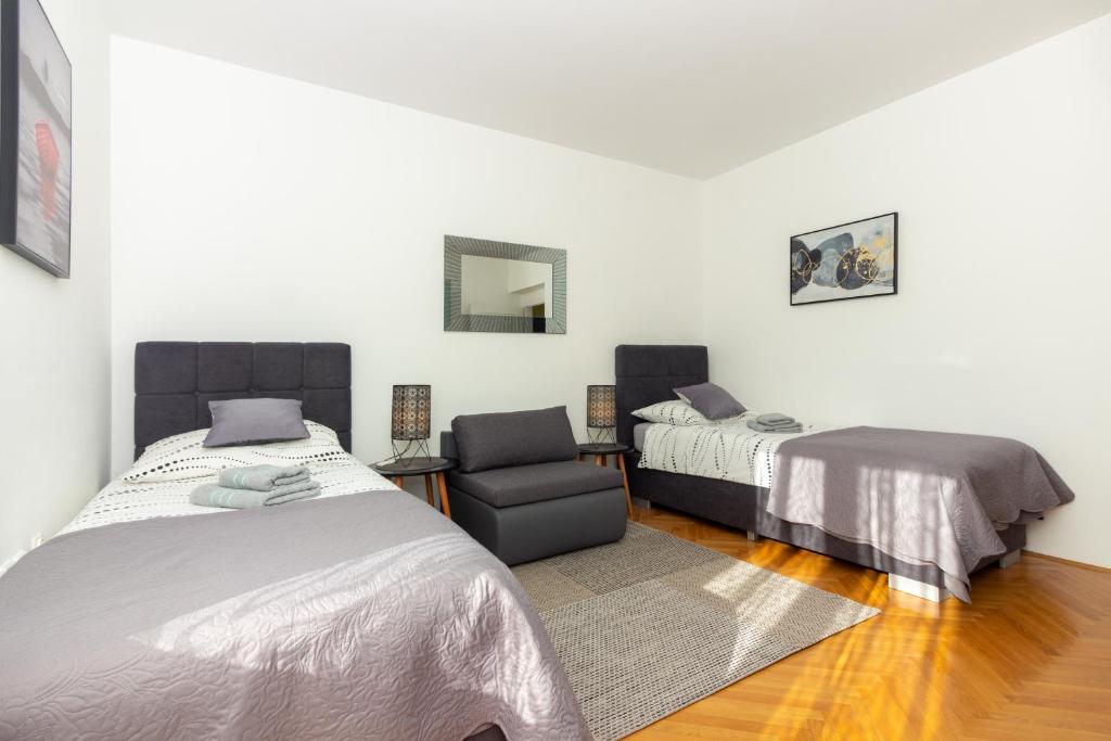 Posteľ alebo postele v izbe v ubytovaní Apartment Fortunella