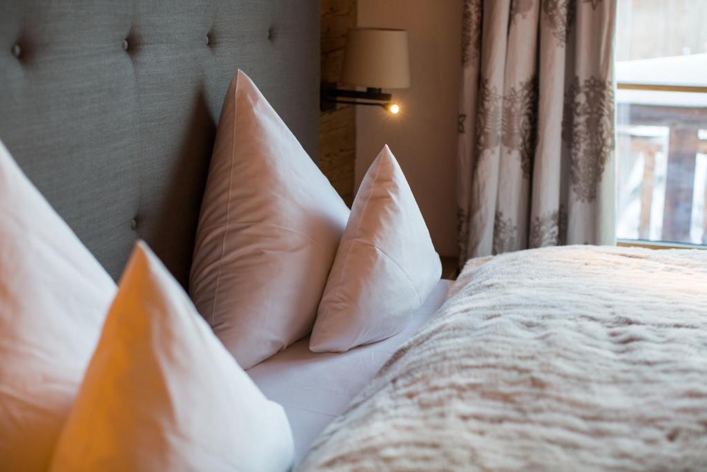 Voodi või voodid majutusasutuse Circle Chalets Arlberg toas