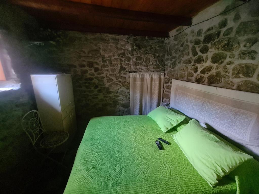 Postel nebo postele na pokoji v ubytování Casa di Pietra