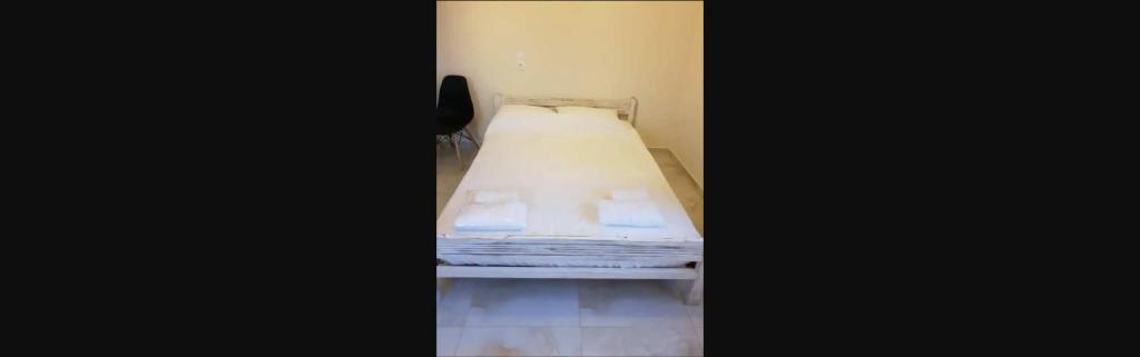 Postel nebo postele na pokoji v ubytování Damianakis Village Rethymno