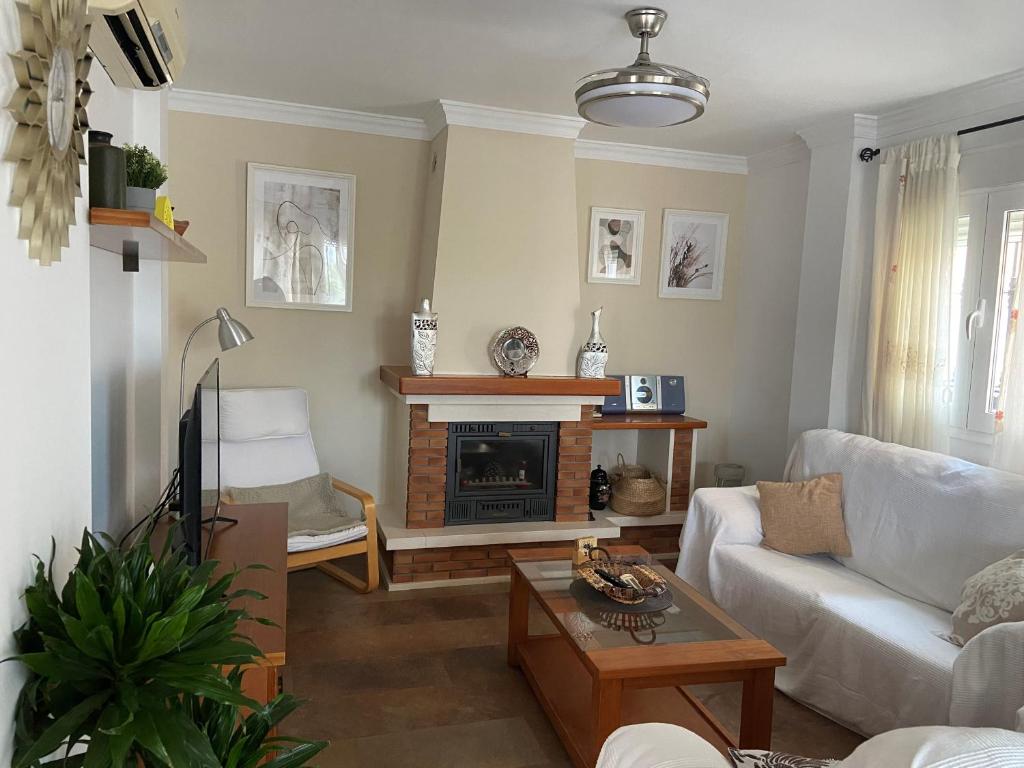 Posezení v ubytování Casa Rosi, vistas al mar, piscina privada y A/A
