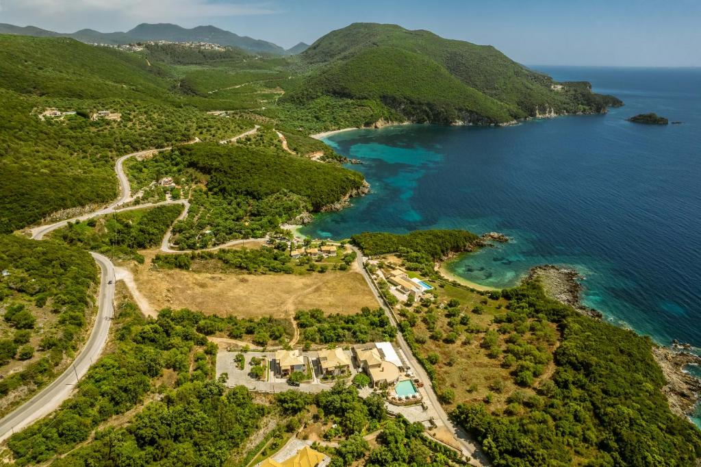 an aerial view of the island of šibenica at 3Aktes Suites & Studios in Syvota