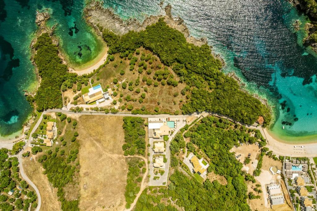 an aerial view of an island in the ocean at 3Aktes Suites & Studios in Syvota