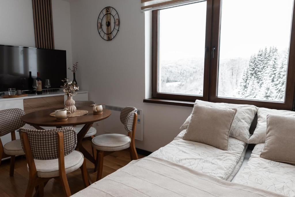 TV a/nebo společenská místnost v ubytování Glečer Kop, Apartment A14, FREE Parking Garage