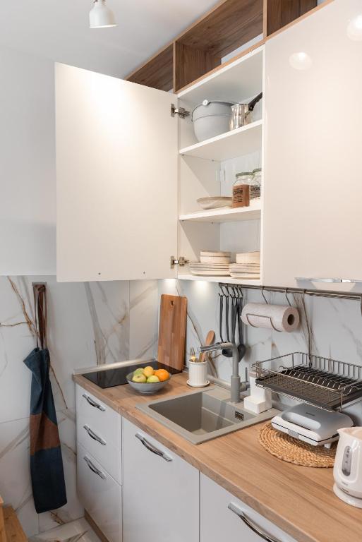 Kuchyň nebo kuchyňský kout v ubytování Glečer Kop, Apartment A14, FREE Parking Garage