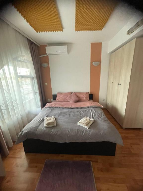 Postel nebo postele na pokoji v ubytování The Bulevard Hotel
