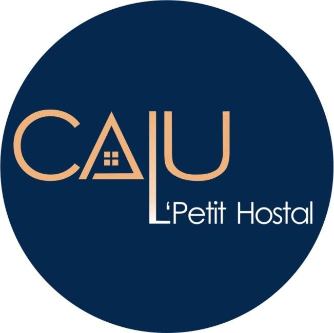 a blue circle with the words ctu petit hospital at Calu L' Petit Hostel in Quito