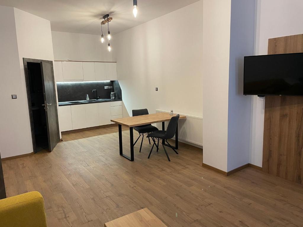 TV a/nebo společenská místnost v ubytování Apartment Elinel