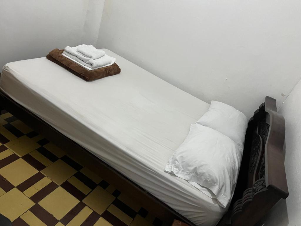 Postel nebo postele na pokoji v ubytování Casa Grande Hostal