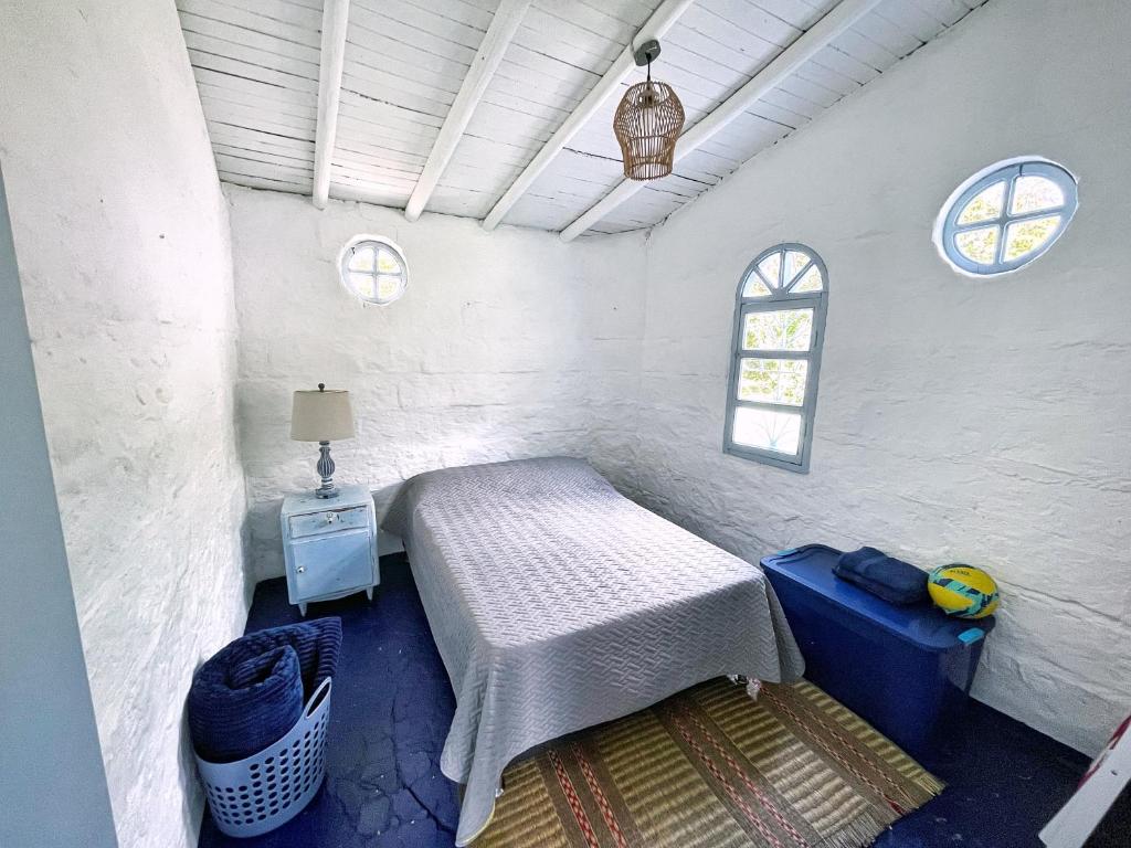 Postel nebo postele na pokoji v ubytování Hermosa Casa frente al Río