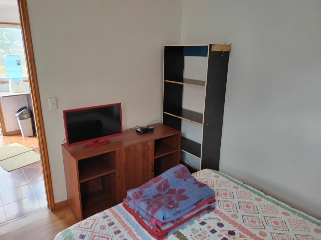 Postel nebo postele na pokoji v ubytování Costa Margarita