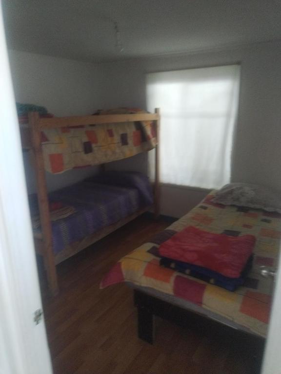 Postel nebo postele na pokoji v ubytování Costa Margarita