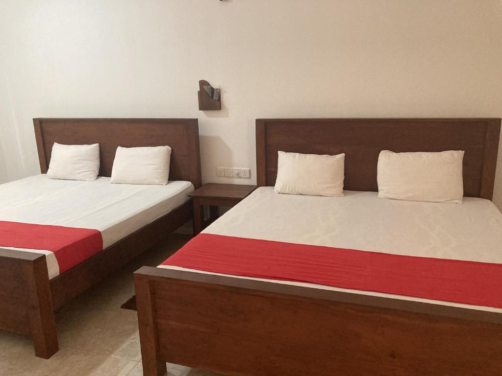Postel nebo postele na pokoji v ubytování Nugasewana Guest