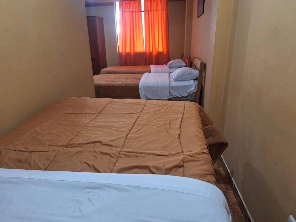 Postel nebo postele na pokoji v ubytování Montañero Hostel II