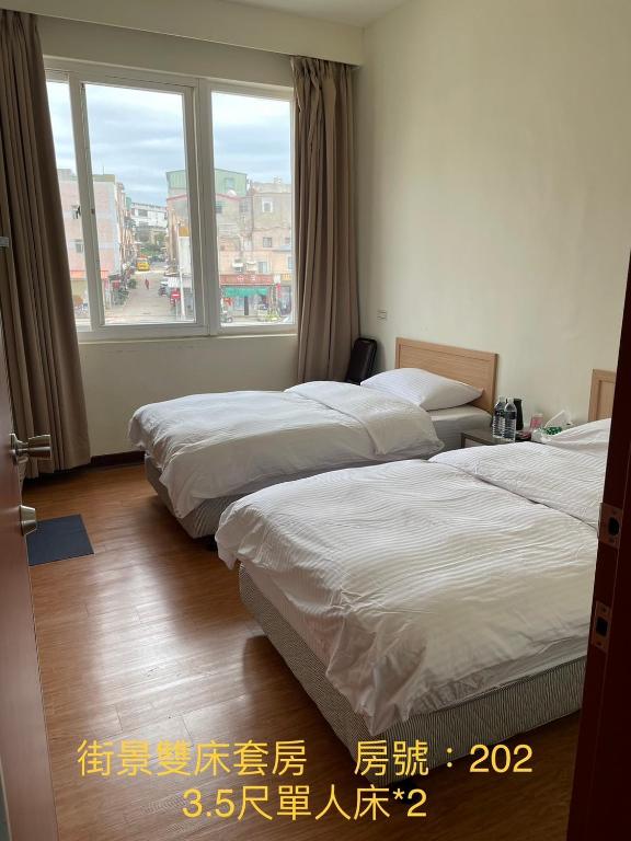 馬港驛站 Oldharbor Hostel房間的床