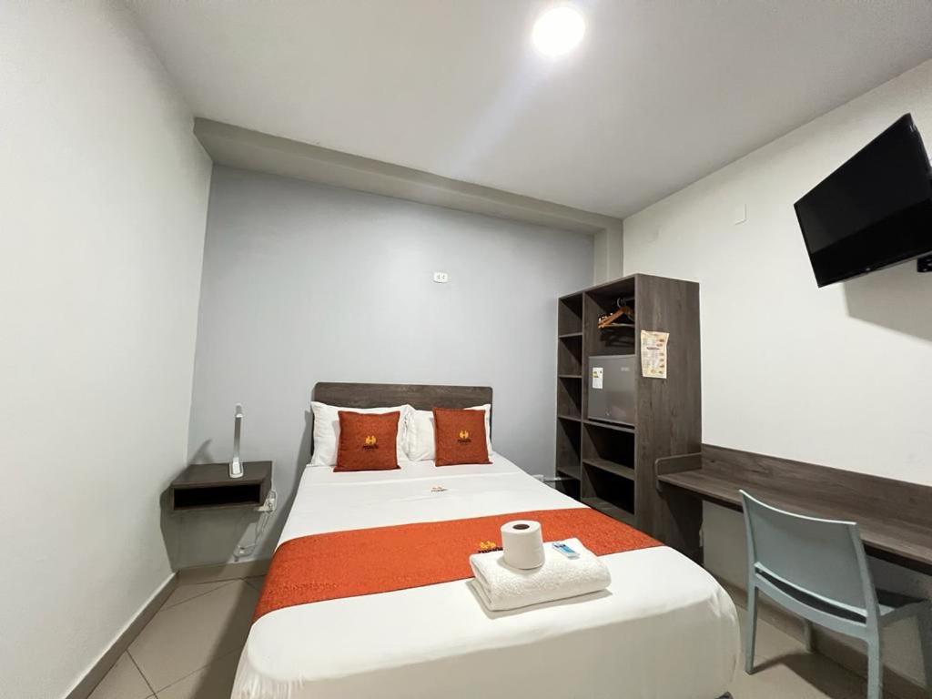 Postel nebo postele na pokoji v ubytování HOTEL MAGIC