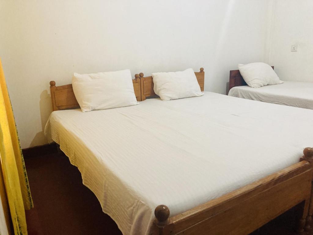 Postel nebo postele na pokoji v ubytování Nugasewana Guest