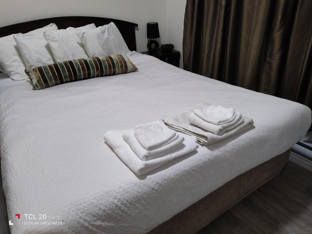 Postel nebo postele na pokoji v ubytování Sweet House B&B