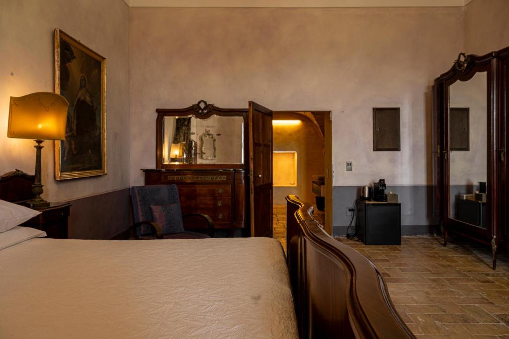 Postel nebo postele na pokoji v ubytování Castello Di Semivicoli