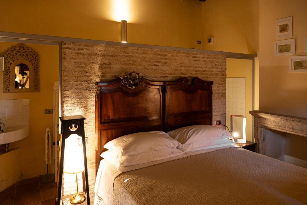 Postel nebo postele na pokoji v ubytování Castello Di Semivicoli