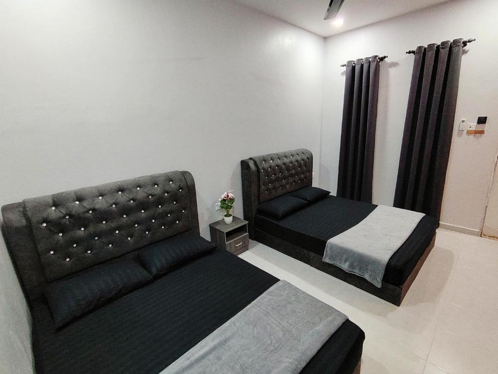 Posezení v ubytování Roomstay Kak Ton