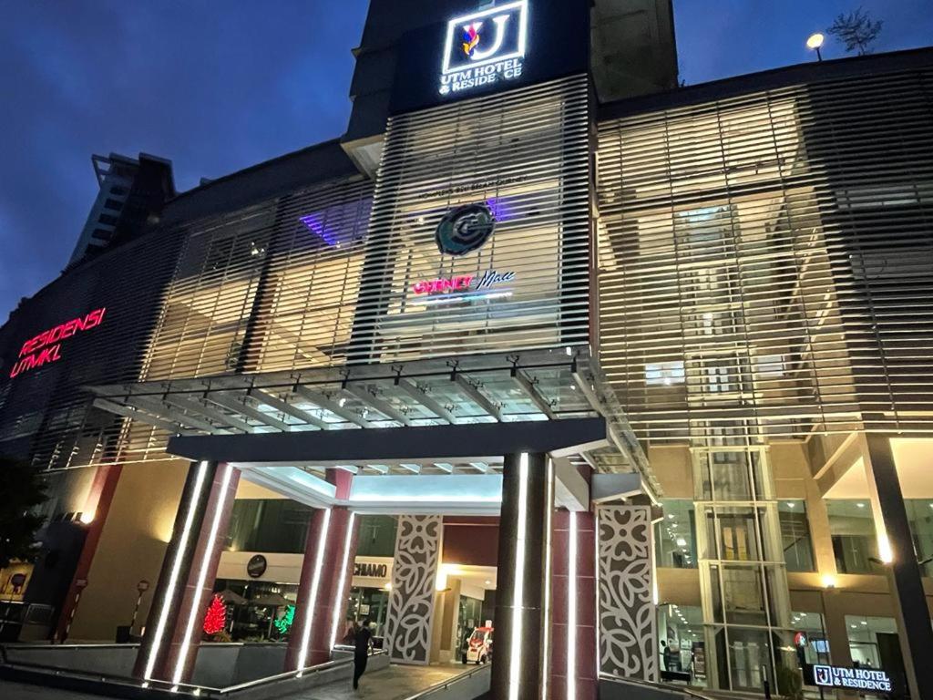 a building with a sign on the front of it at UTM Hotel & Residence in Kuala Lumpur